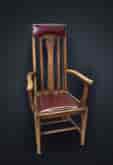 Oak Arts & Crafts armchair, red leather, circa 1900