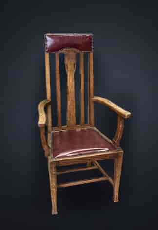 Oak Arts & Crafts armchair, red leather, circa 1900