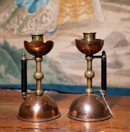 Pair of Christopher Dresser candlesticks, designed & made 1885, probably by Benham & Froud for the Art Furnishers' Alliance, London. 