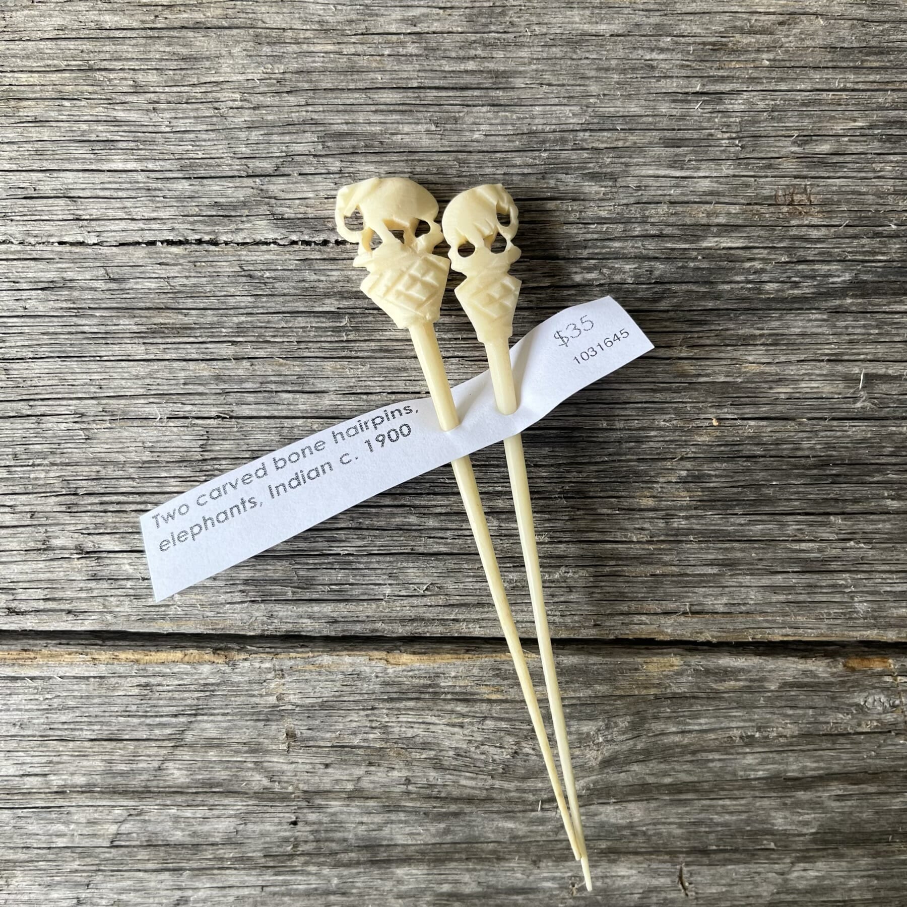 Two carved bone hairpins, elephants, Indian c. 1900