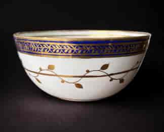 Caughley waste bowl with cobalt border and gilt swags, c.1785