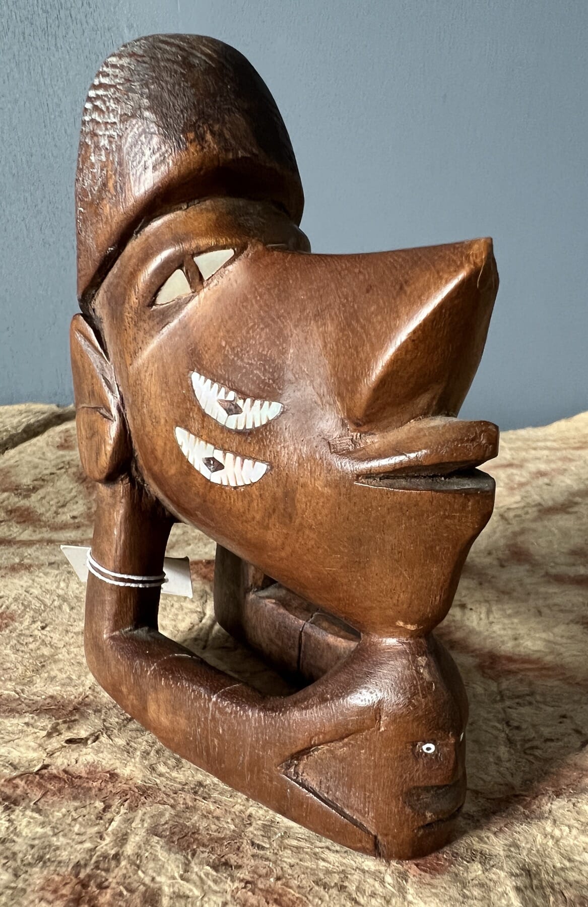 Solomon Islands 'nguzu nguzu' head model, canoe prow, inlaid pearlshell, mid - late 20th c.