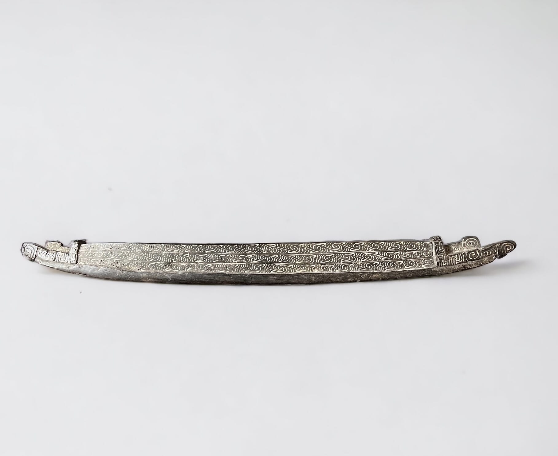 Solomon Islands Trobiand carved model canoe, lime details, mid 20th c.