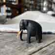 Ceylonese carved ebony elephant, with wooden tusks Early 20th C