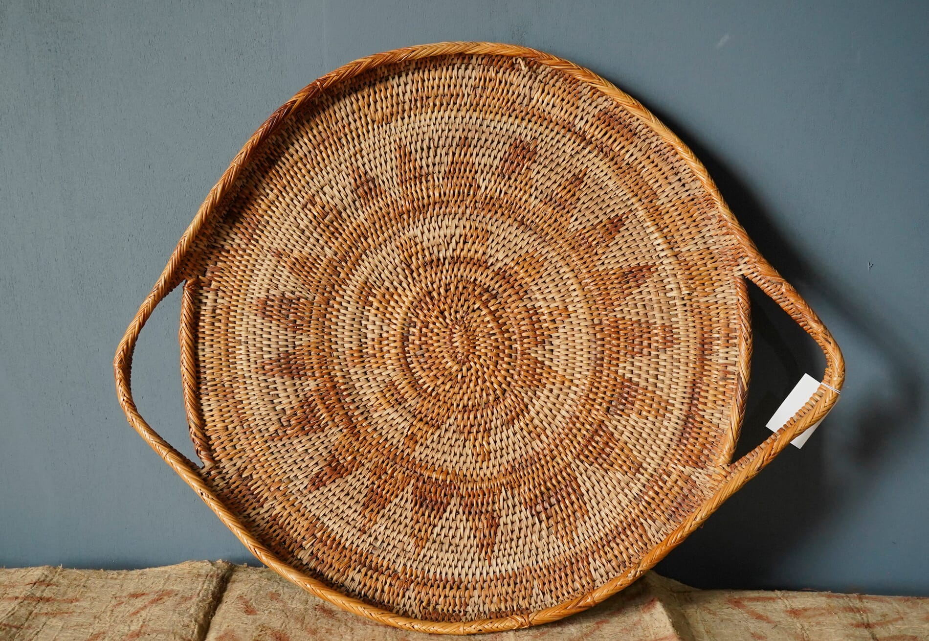 PNG basket weave tray with Sun design & handles, 20th c.