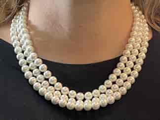Fresh water pearl triple strand necklace, 20th C