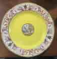 Coalport plate, London decorated with scene, yellow ground, classical busts, c.1805