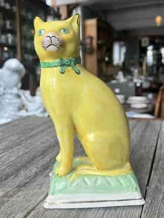Staffordshire yellow cat, 20th C