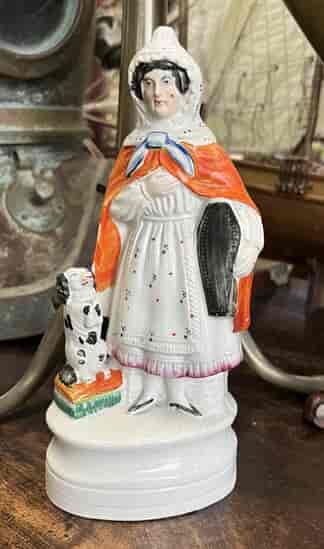 Rare Staffordshire figure of ‘Old Mother Hubbard’, c. 1860