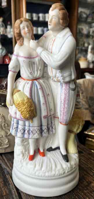 Victorian  bisque porcelain figure group, a harvest couple, C 1870