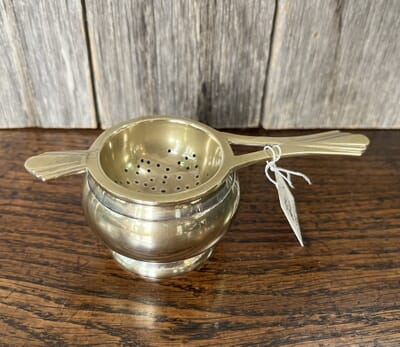 A Collection of Vintage Silver Tea Strainers .