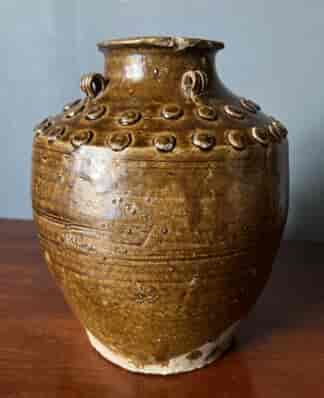 Chinese pottery jar, brown glaze with embossed disks, Qing Dynasty