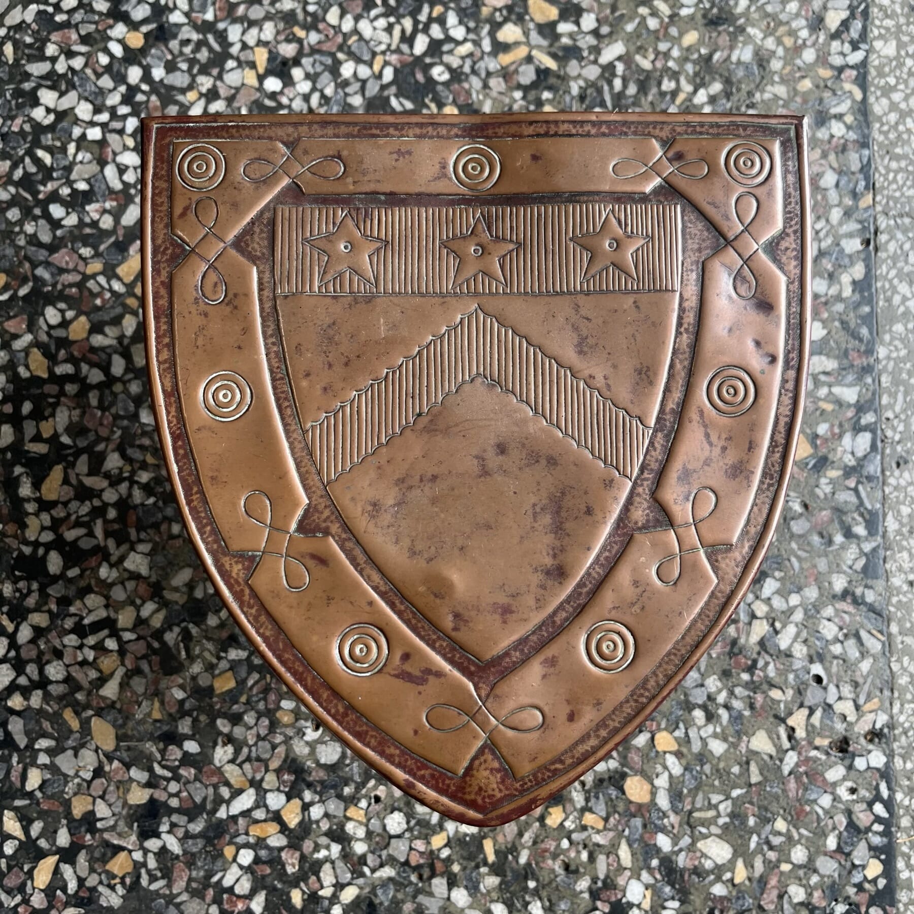Copper Arts + Crafts fireside trivet, Medieval Shield shape, c. 1880