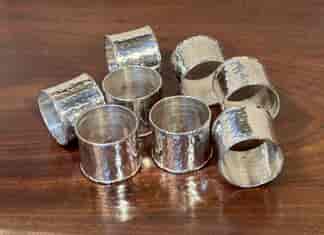 Set of 8 Silverplate Arts & Crafts napkin rings, c. 1920