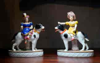 Very Rare pair of Minton 'Royal Children' riding on large dogs, c. 1840