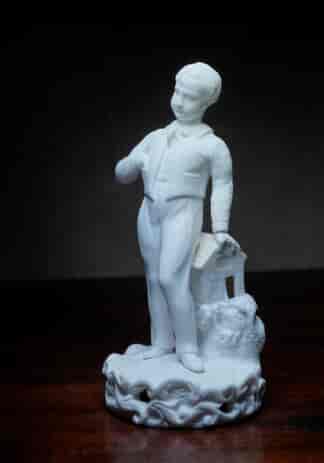 Bisque figure of a boy with a mouse & toy house, C. 1835