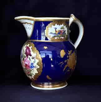 Chamberlain's Worcester jug, flowers + exotic bird panels, raised gilt + Royal Blue ground, c. 1825