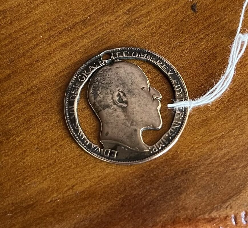 Edward VII Sterling Silver medallion with cut-out head, schilling c.