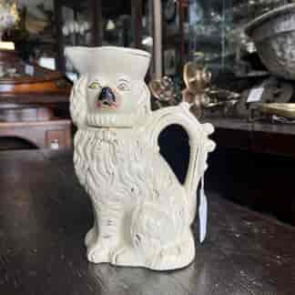 Staffordshire spaniel dog jug, circa 1860