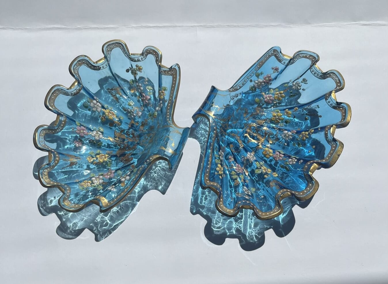 Blue glass shell dishes with Moser style decoration, c.1880