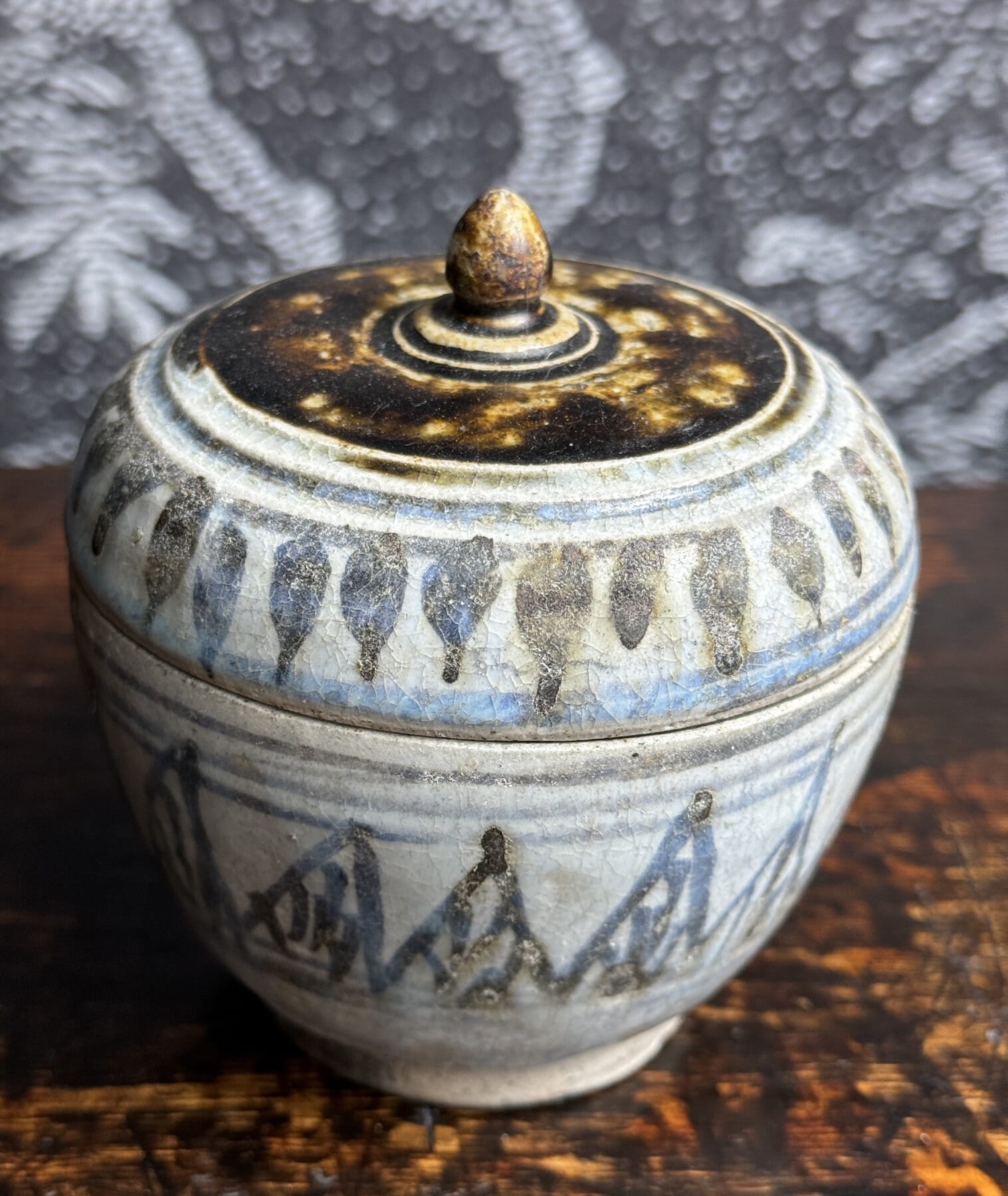 Sawankhalok (Thai) stoneware covered box, unusual brown + pale decoration, 15th c.