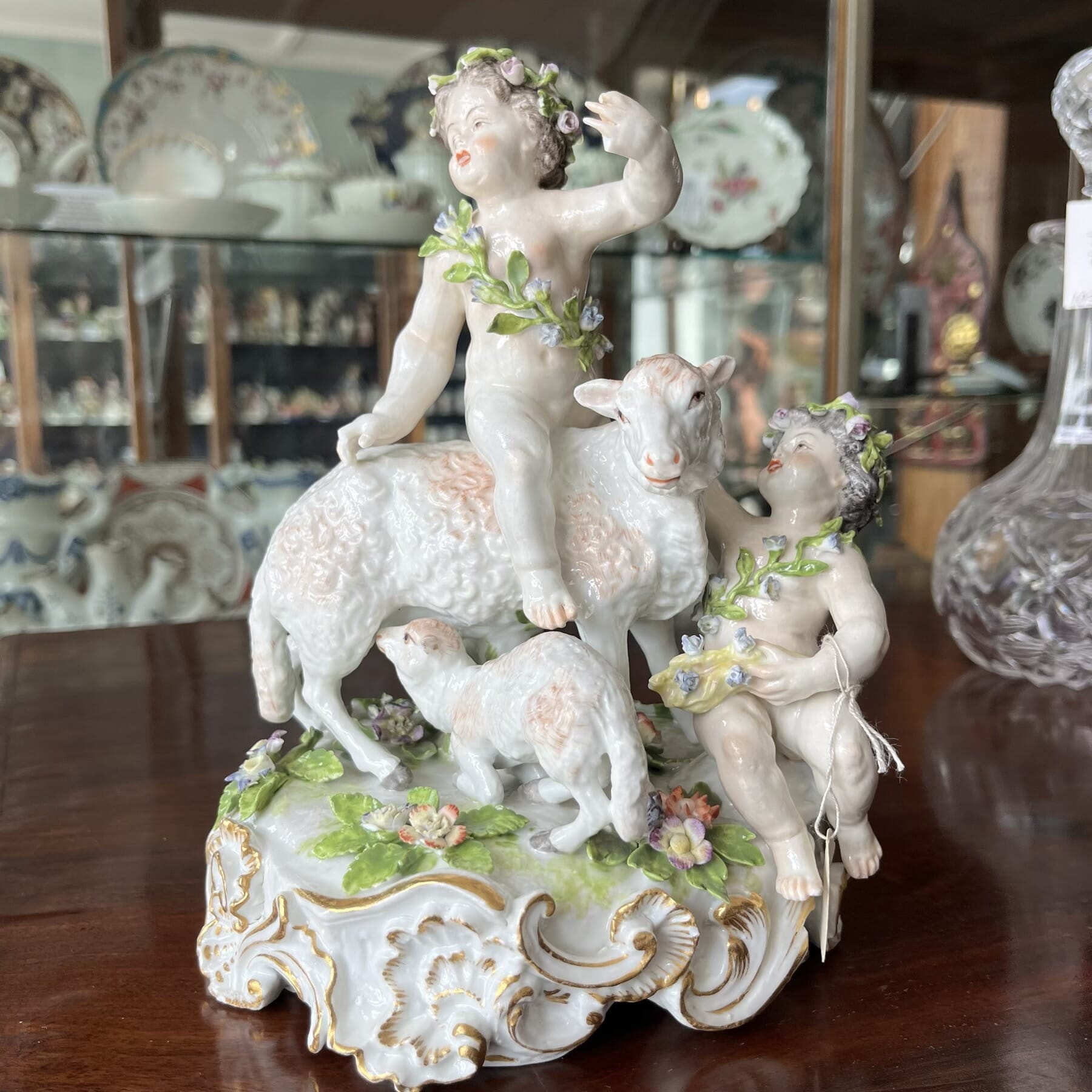 Sampson porcelain group of children with sheep, Meissen style, late 19th century