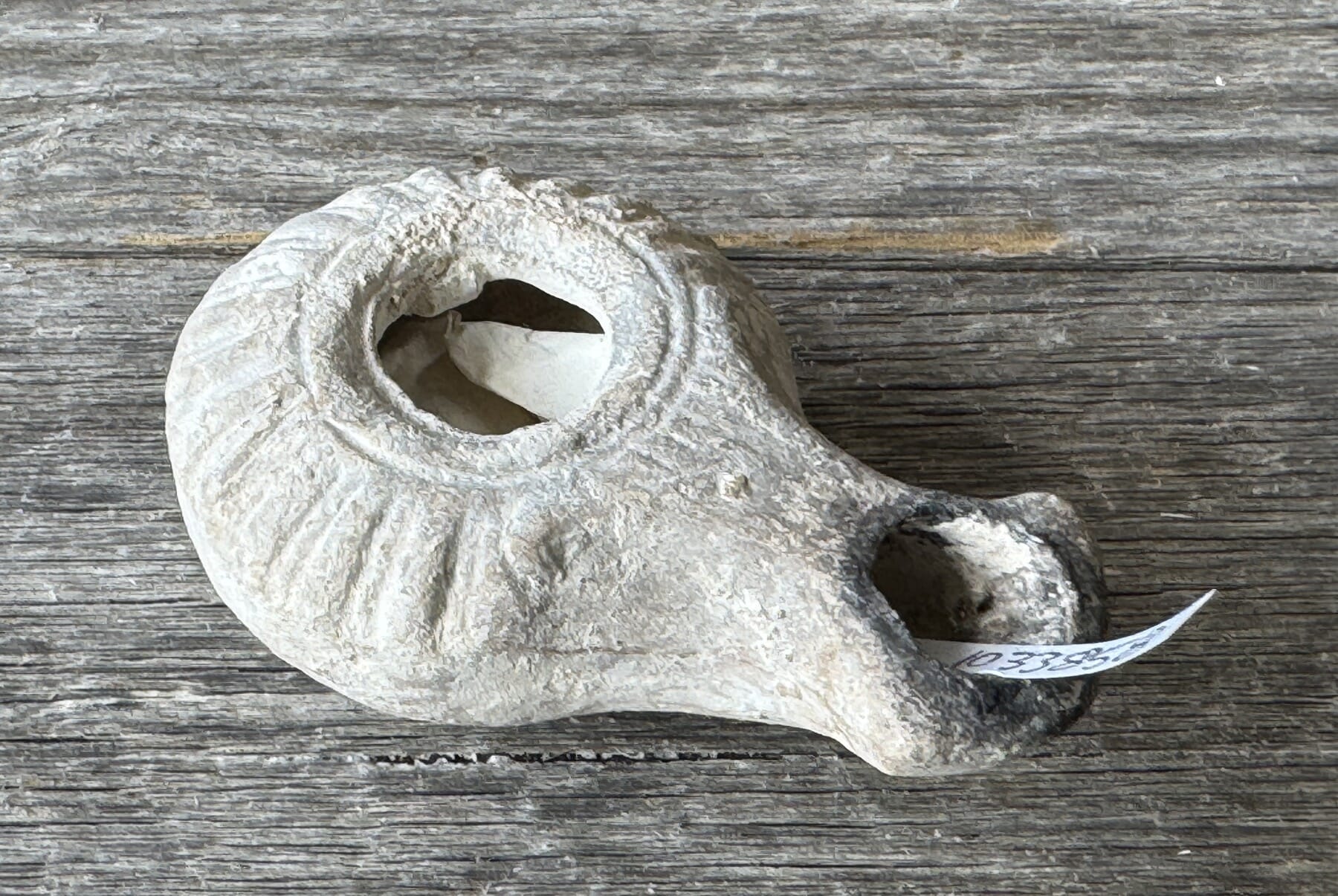 Roman pottery oil lamp with moulded shoulder, 2nd - 4th century AD