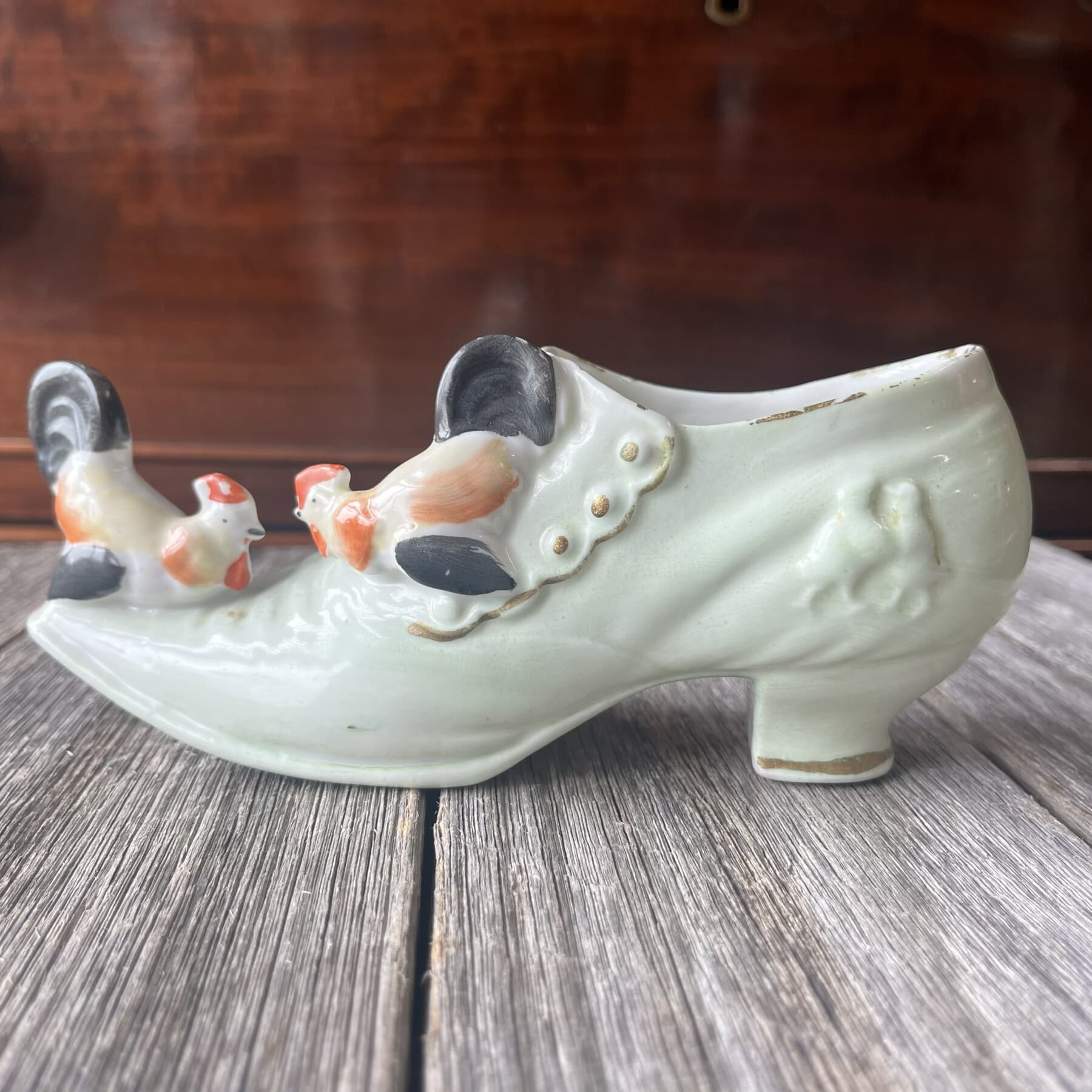 German Porcelain shoe with fighting roosters, c. 1895