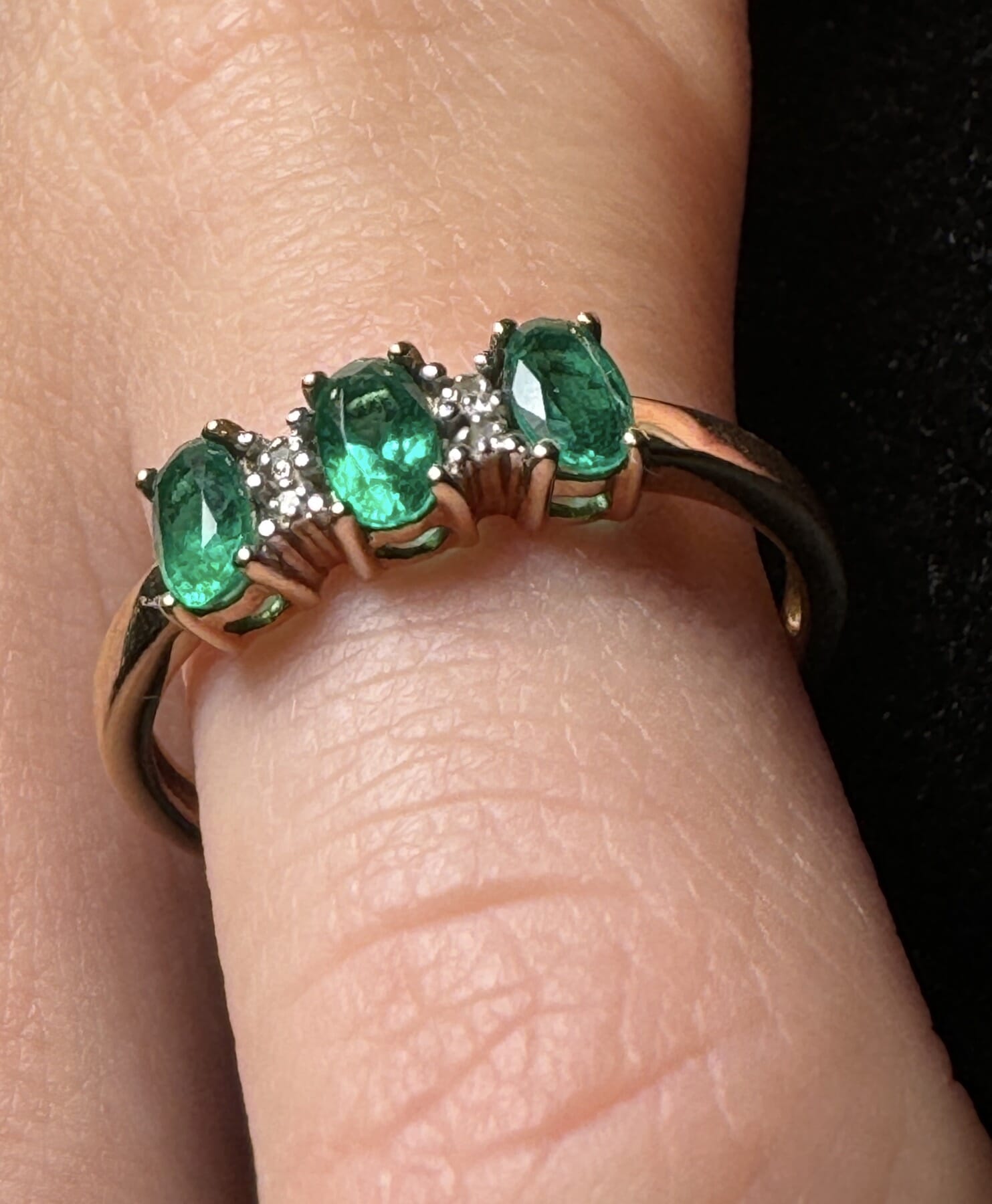 9ct Gold ring with three 'Created Emeralds', 20th C.