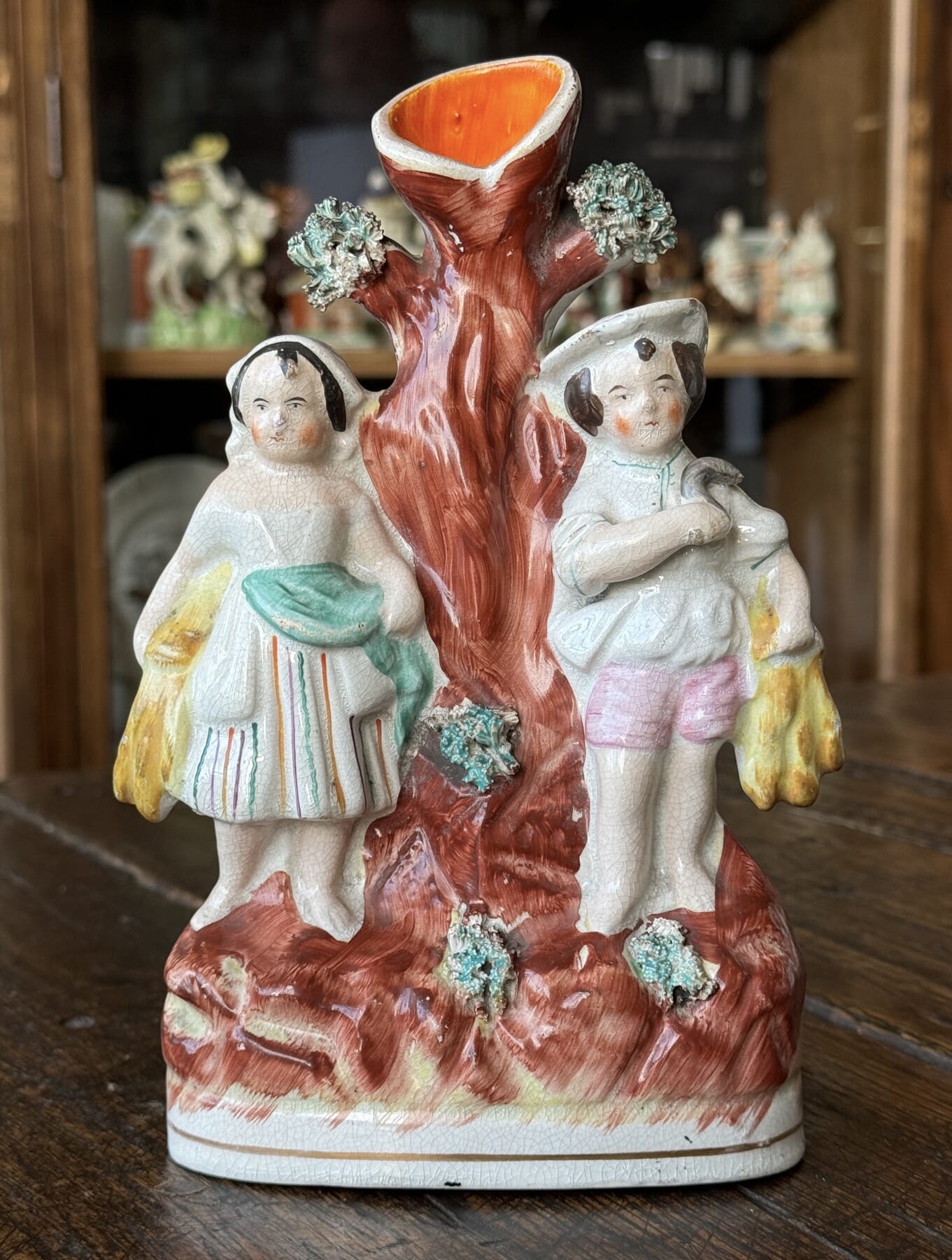 Staffordshire pottery spill vase, young harvesters, c. 1870