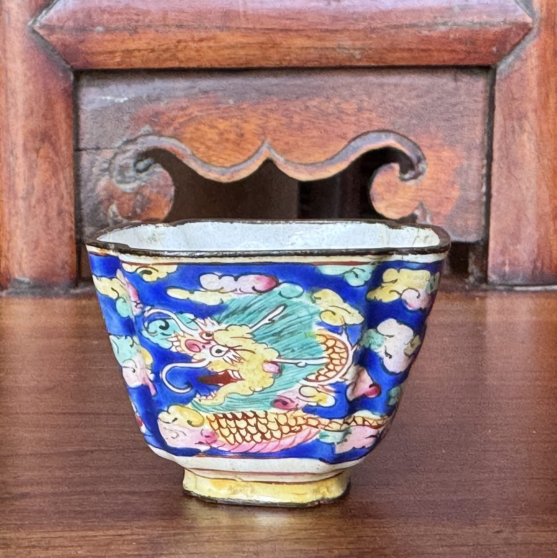 Chinese Cantonese Enamel cup with dragon amongst clouds, earlier 19th century