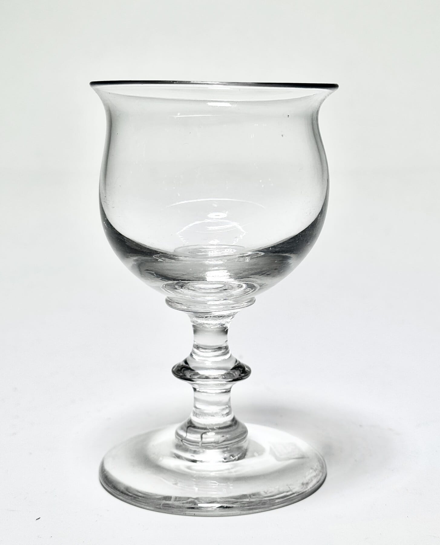 Late Georgian wine glass, bell shape with bladed knop, ground pontil, c. 1825